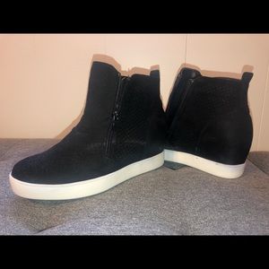 Black platform sneakers